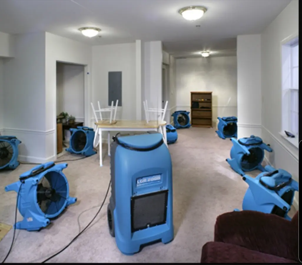 Air movers and dehumidifier setup for Water Damage Restoration in Bethalto